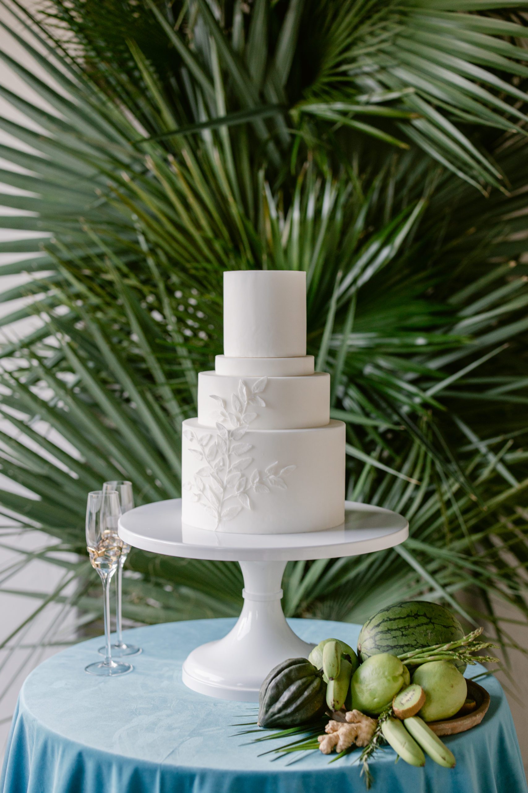Destination wedding cake with Palm leaves